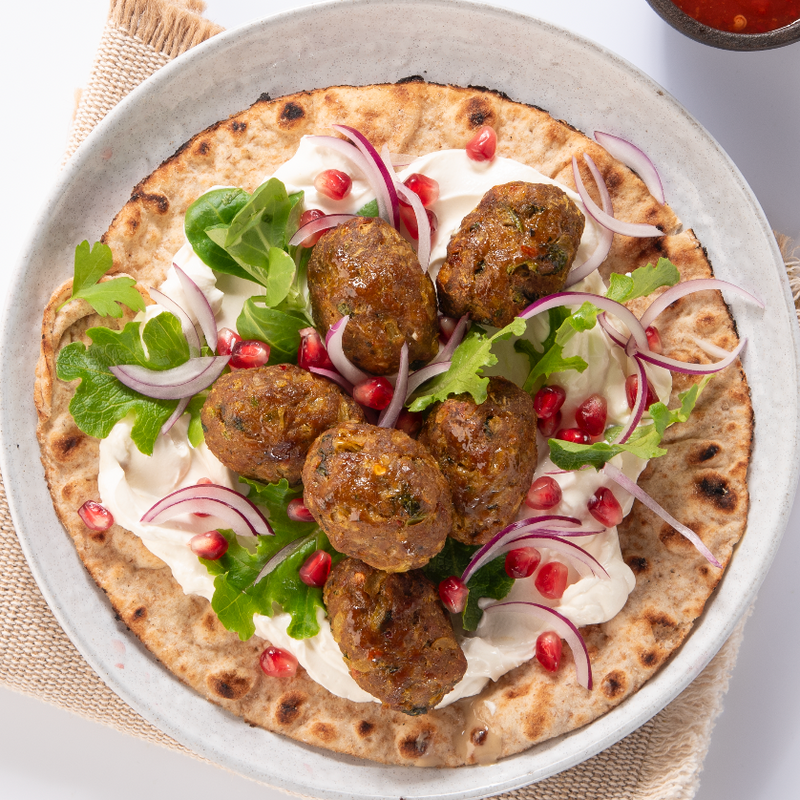 Lamb sheesh bites with white sauce with paratha
