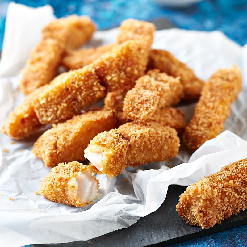 Breaded and fried fish sticks on a plate.